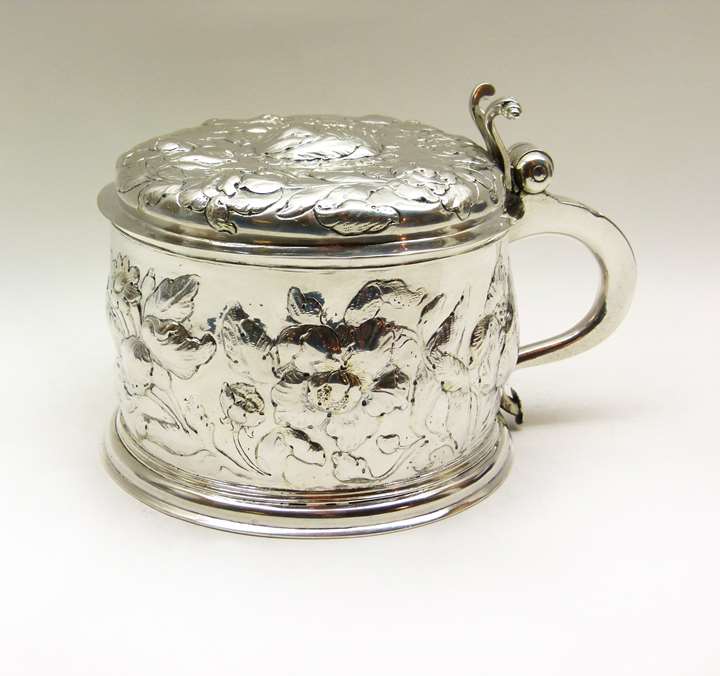 17th century German embossed silver tankard